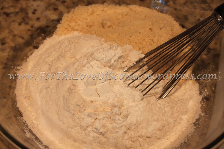 Combine the dry ingredients, flours, baking powder, baking soda, and salt. Whisk to mix.