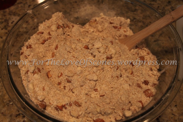 Add the chopped almonds and toss with a wooden spoon to mix.