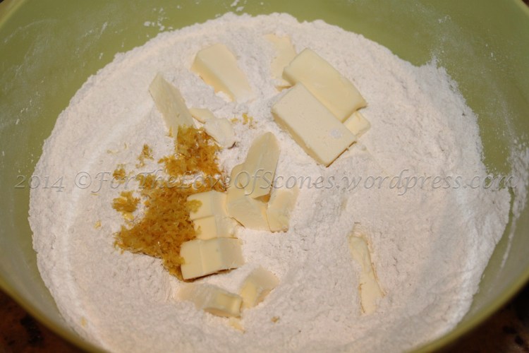Add the zest and butter to the dry ingredients and work in with a pastry blender.