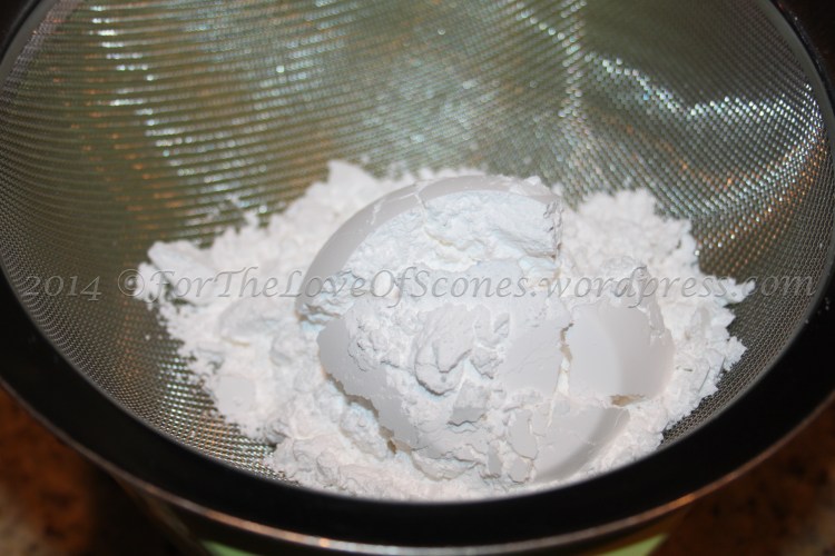 Sift the confectioner's sugar through a mesh sieve in order to avoid getting clumps in your glaze.