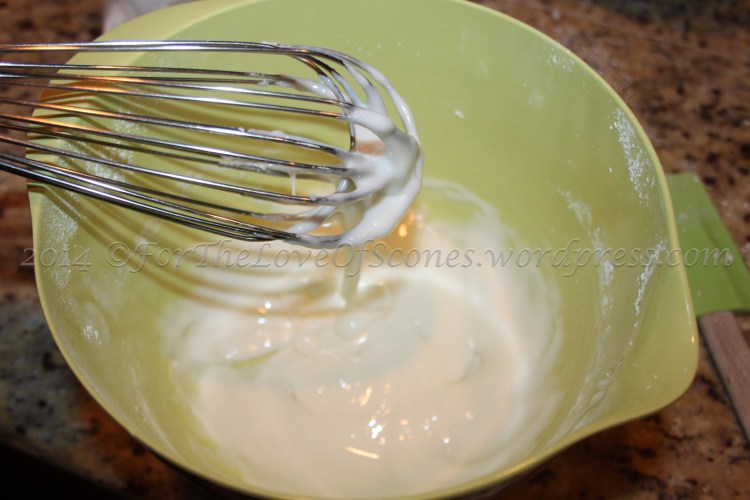 In order to get a drizzling consistency, add half and half until the mixture is thick, but able to be drizzled over your cooling scones. 