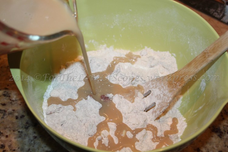 Add the maple syrup mixture to the dry ingredients and stir with a wooden spoon to mix.
