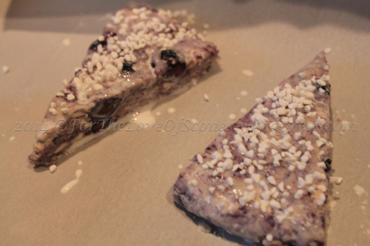 Place on a parchment-lined baking sheet a couple of inches apart. Brush with leftover buttermilk and sprinkle with coarse sugar or Swedish Pearl sugar (shown here).