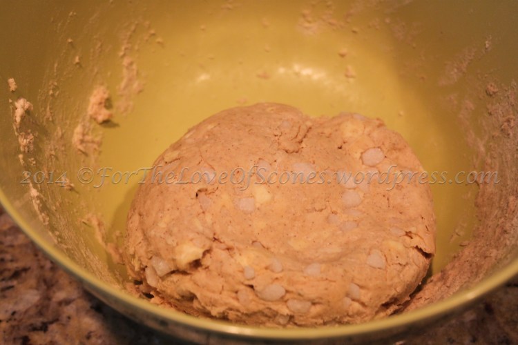 Give the dough a couple of kneads to work in the sugar.